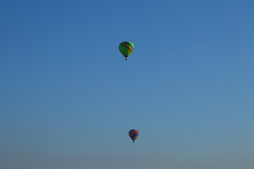 Colorful Hot Air Balloons Against a Clear Blue Sky