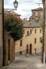 Italy, Marche, Offida - medieval alley in downtown Offida