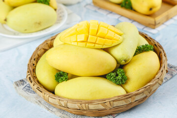 Fresh Golden Vietnam Mangoes in Wicker Basket - Tropical Fruit Display