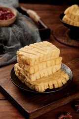 Traditional Chinese Tofu Skewers on Wooden Plate - Asian Vegetarian Food from Henan Province