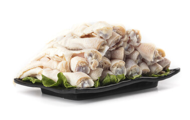 Fresh Raw Chicken Feet and Wings on Black Tray with Lettuce Garnish for Asian Cooking