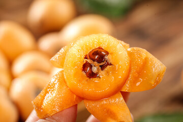 Fresh Loquat Fruit Slices from Sichuan Mountains - Traditional Chinese Orange Fruit with Seeds and Natural Sweet Flavor