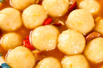 Handmade Fish Ball Soup with Chili Peppers in Hot Broth - Traditional Asian Comfort Food Ingredients