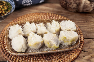Steamed Taro Dumplings Shandong Style Chinese Cuisine Traditional Food Bamboo Basket Wooden Table