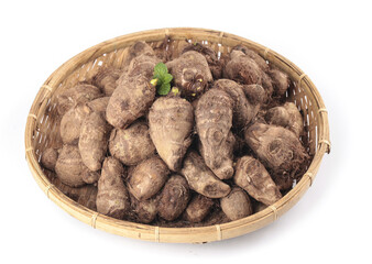 Fresh Taro Root Vegetables in Bamboo Basket - Organic Asian Produce Display