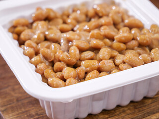 Japanese Natto Fermented Soybeans in Container - Traditional Healthy Food with Sticky Texture