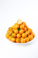 Sweet Guangxi Kumquats on White Plate - Fresh Orange Citrus Fruits Display