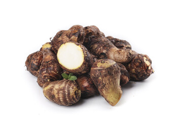 Fresh Taro Root Vegetables with Cross Section Showing White Flesh - Asian Cooking Ingredient