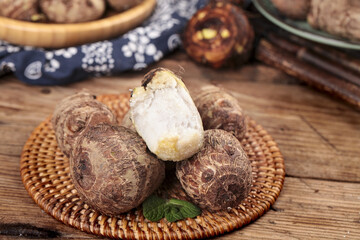 Fresh Shandong Taro Roots in Wicker Basket - Traditional Chinese Cooking Ingredient