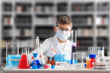 Little child make chemistry science experimental chemistry lessons.