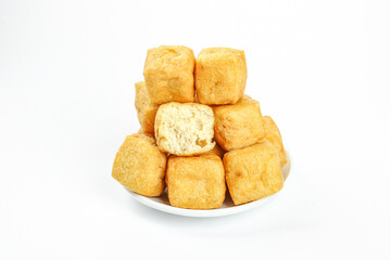 Deep Fried Tofu Puffs on White Plate - Golden Crispy Asian Food Cubes
