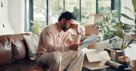 Moving in, man and stress with documents in new home for title deed error, compliance issue or worry. Homeowner, person or headache with paperwork for hidden insurance clause, mortgage debt or crisis