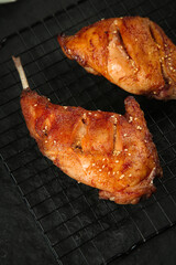 Szechuan Style Smoked Rabbit Legs with Sesame Seeds Fresh from Grill