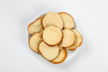 Sliced Vegetarian Tofu Sausage on White Plate - Plant-Based Protein Food Product