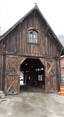 Rustic wooden barn with large entryway