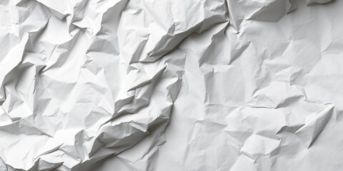 Obraz premium Close-up of a crumpled sheet of white paper, texture and creases prominent, paper texture background, surface