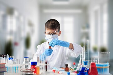 Little child make chemistry science experimental chemistry lessons.