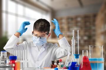 Little child make chemistry science experimental chemistry lessons.