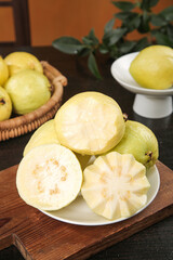 Fresh White Guava Fruit Sliced on Plates Showing Creamy Soft Flesh - Tropical Food Photography