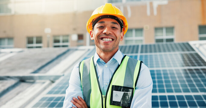 Solar panel, happy man and portrait of engineer on roof in city with confidence. Photovoltaic electrician, smile and technician with renewable power, sustainable electricity and clean energy outdoor