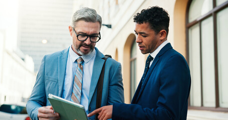 Lawyers, men and tablet outdoor with discussion for court preparation, litigation or legislation...