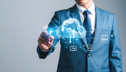 Man in a suit interacting with a glowing cloud icon surrounded by digital devices against a light gray background