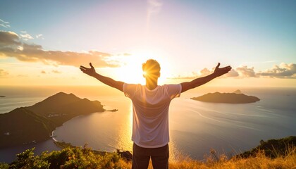A person with arms outstretched, enjoying a sunset over a tranquil bay