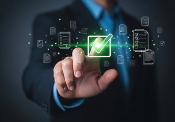 Fototapeta premium Businessman touching glowing green checkmark on digital screen with documents hand finger