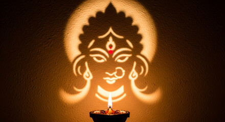Divine goddess kali's shadow illuminated by candlelight creating a mystical religious aura