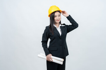 An Asian female engineer poses in a white background studio, holding a blueprint that conveys her leadership and influence across the global industry, blending elegance with knowledge.