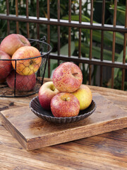 Fresh Organic Apples in Rustic Bowl on Wooden Board - Healthy Farm Fruit Display