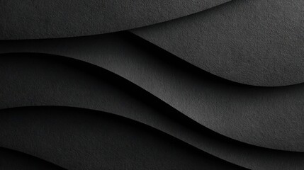Abstract black paper layers creating wavy pattern with subtle shadows and textures