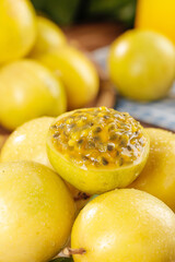 Fresh Golden Passion Fruit with Juicy Pulp and Seeds Display