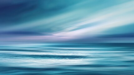 Obraz premium An abstract seascape with blurred motion, showcasing a tranquil blend of teal, blue, and purple hues at the horizon, suggesting a serene and dreamy atmosphere