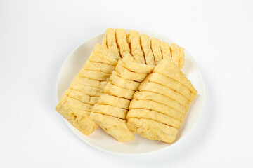 Dried Tofu Slices on White Plate - Asian Vegetarian Protein Food Ingredient