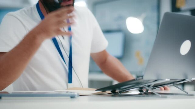 Businessman Call Center Agent Using laptop Computer for CRM, IT Support, and Remote Client Communication, Helping Clients Solve Technical Issues and Providing Online Consulting at Help Desk in Office