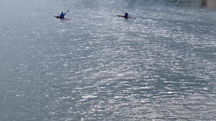 Two sport man rowing on river in Shatin, Hong Kong - Powered by Adobe