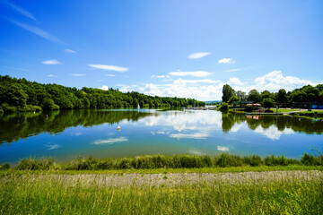 View of the Bucher Reservoir and the surrounding landscape. Nature near Rainau.

