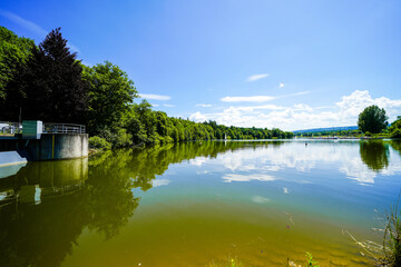 View of the Bucher Reservoir and the surrounding landscape. Nature near Rainau.
