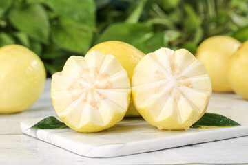 Fresh White Heart Guava Fruits from Guangxi China with Soft Golden Cream Flesh on Cutting Board