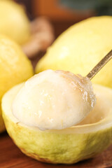 Fresh White Guava Fruit Cut in Half Showing Soft Translucent Flesh and Seeds Close-Up