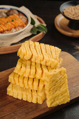 Dried Tofu Sticks on Wooden Board - Traditional Asian Henan Cuisine Ingredients