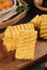 Sliced Dry Tofu on Wooden Board - Traditional Henan Cuisine Ingredient for Asian Cooking and Skewers