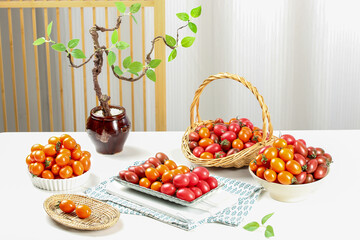 Fresh Mixed Tricolor Cherry Tomatoes in Wicker Basket and Bowls - Small Virgin Fruit Display