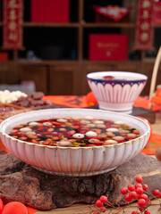 Eight Treasure Porridge with Mung Bean and Red Date Healthy Chinese Dessert in Traditional Bowl