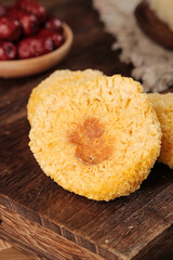 White Tree Ear Fungus Fresh Edible Mushroom on Wooden Board Asian Cooking Ingredient