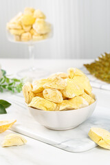Golden Dried Durian Fruit Pieces in Bowl - Asian Tropical Specialty Snack Food