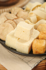 Fresh and Fried Tofu Cubes on Hot Cast Iron Platter - Asian Vegetarian Protein Food