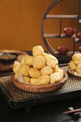 Handmade Golden Fried Bean Puffs in Traditional Woven Basket Asian Food Photography