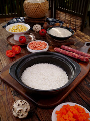 Fragrant Long Grain Rice with Fresh Cooking Ingredients Traditional Asian Kitchen Setup